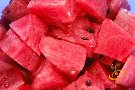 Fresh watermelon with black diamond seeds, showcasing vibrant green rind and juicy red flesh, by SeedsNow.