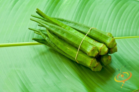 Clemson Spineless okra seeds from SeedsNow shown in a close-up image, ready for planting in a vegetable garden.